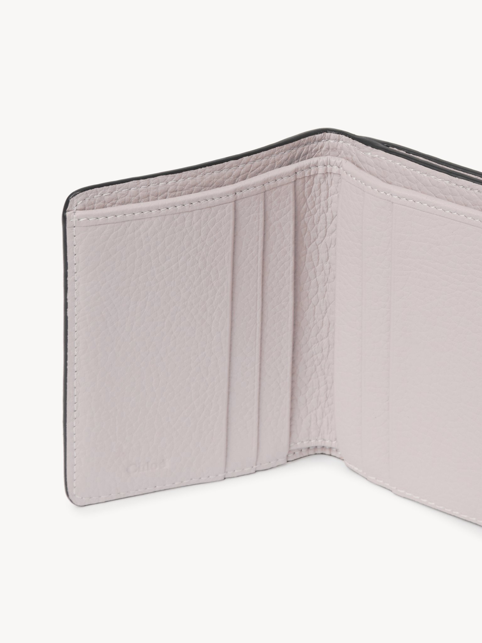 Small Alphabet tri-fold in grained leather Grained & shiny calfskin
Pink - Beige Back view of the product