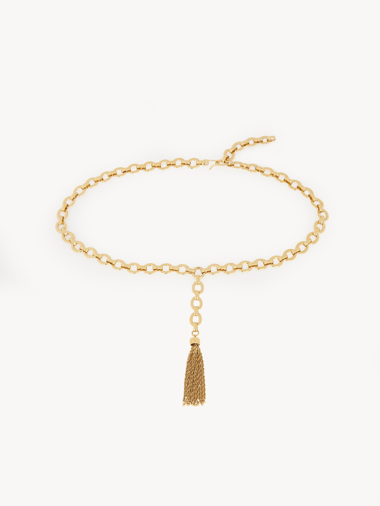 The Chloé Pompoms belt Brass
Vintage Gold