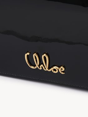 Chloé Iconic flap wallet on chain in patent leather Patent calfskin
Black 