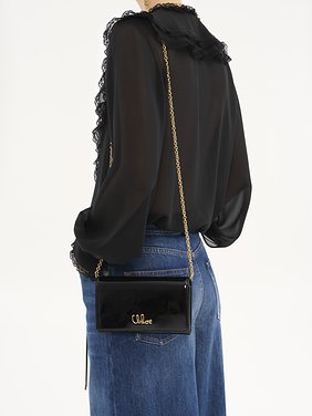 Chloé Iconic flap wallet on chain in patent leather Patent calfskin
Black 