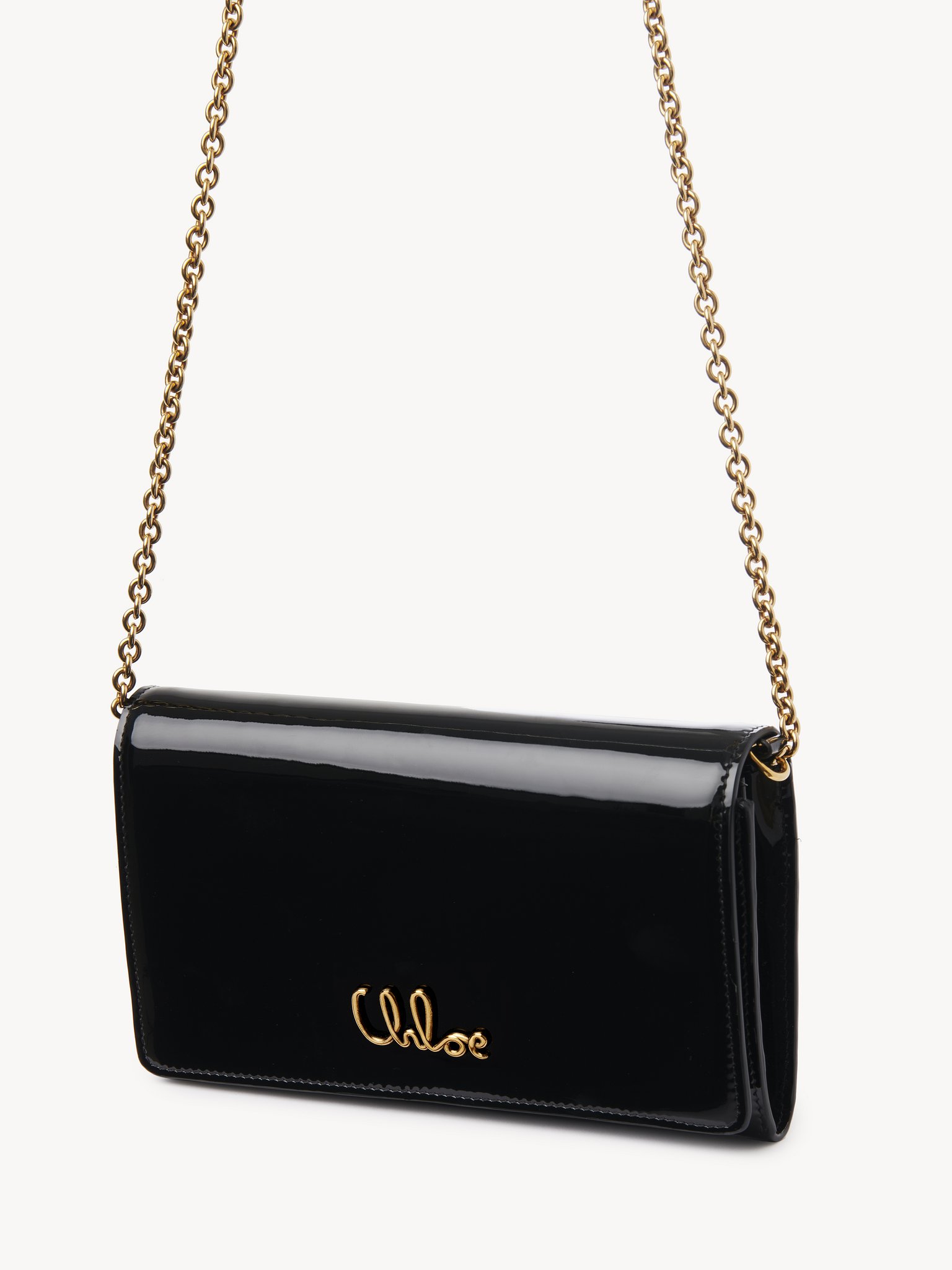 Chloé Iconic flap wallet on chain in patent leather Patent calfskin
Black Back view of the product