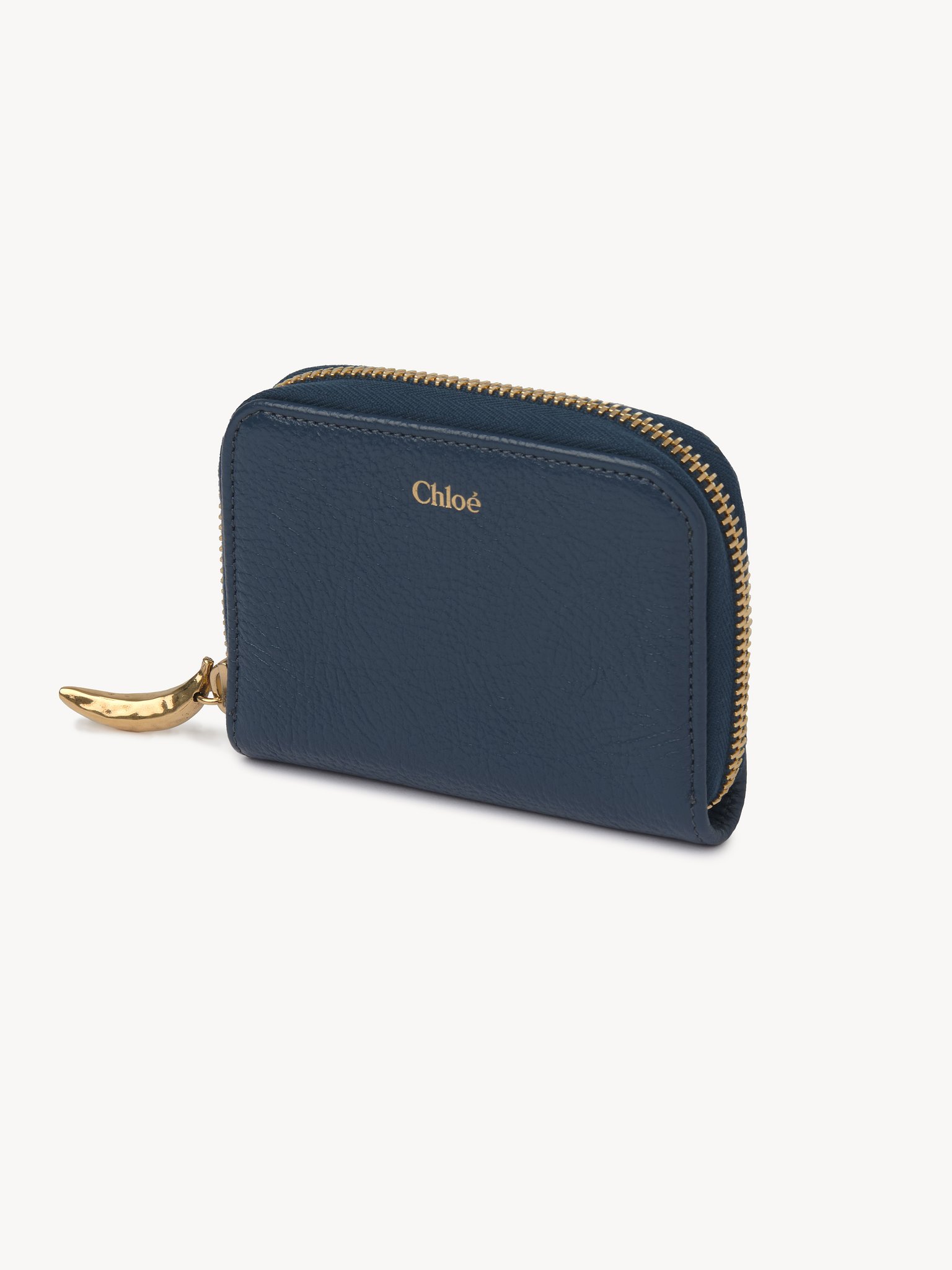 Banana zipped coin purse in grained leather Shiny grained calfskin
Tapestry Blue Back view of the product