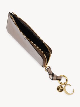 Alphabet purse in metallized leather Metallized calfskin
Shiny Grey Product detail