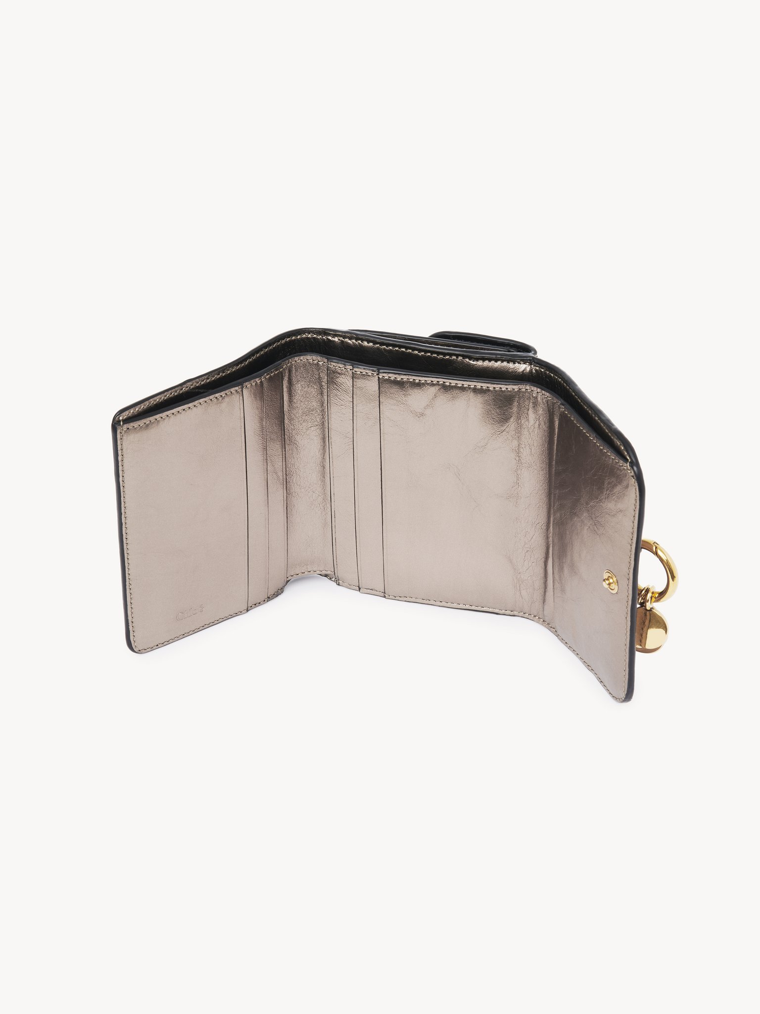 Small Alphabet tri-fold in metallized leather Metallized calfskin
Shiny Grey Product detail