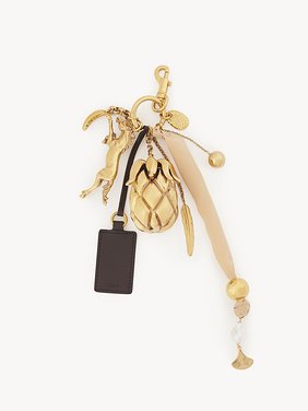 Giga pineapple bag charm in brass, leather & fabric Brass, calfskin & fabric
Gold