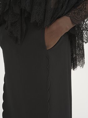 Scallop embroidered column skirt in fluid viscose Soft viscose & wool twill
Black Front view of the product being worn