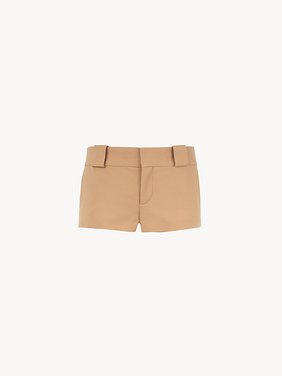 Tailored mini shorts in wool grain de poudre Lower-impact wool gabardine
Mustard Brown