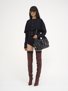 High-waisted mini shorts in wool & cashmere Lower-impact wool & cashmere knit
Classic Navy Back view of the product