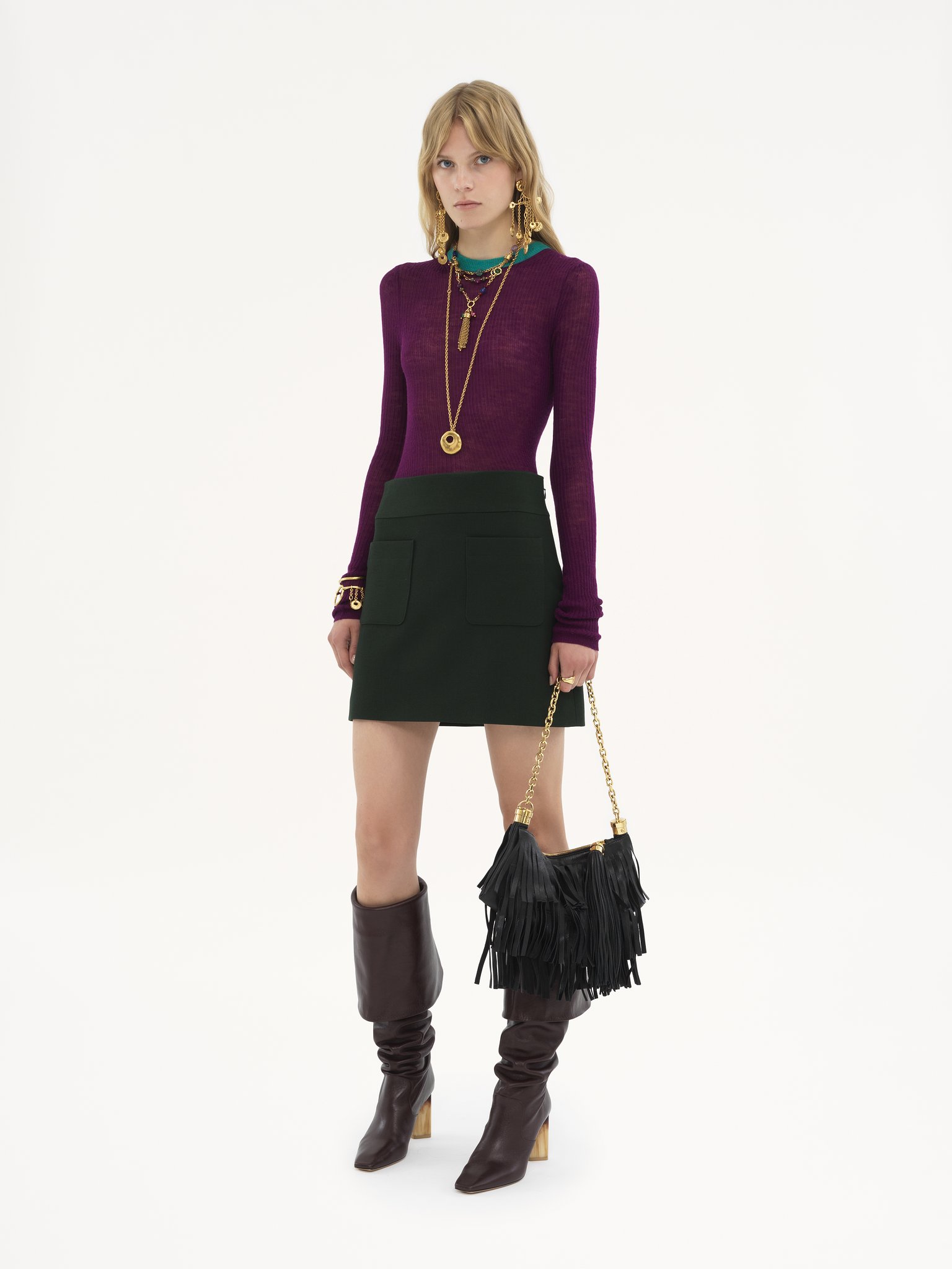 Tailored mini skirt in wool crêpe Lower-impact wool crêpe
Nightfall Green Back view of the product