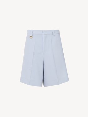 Tailored shorts in wool crêpe Lower-impact wool crêpe
Ash Blue