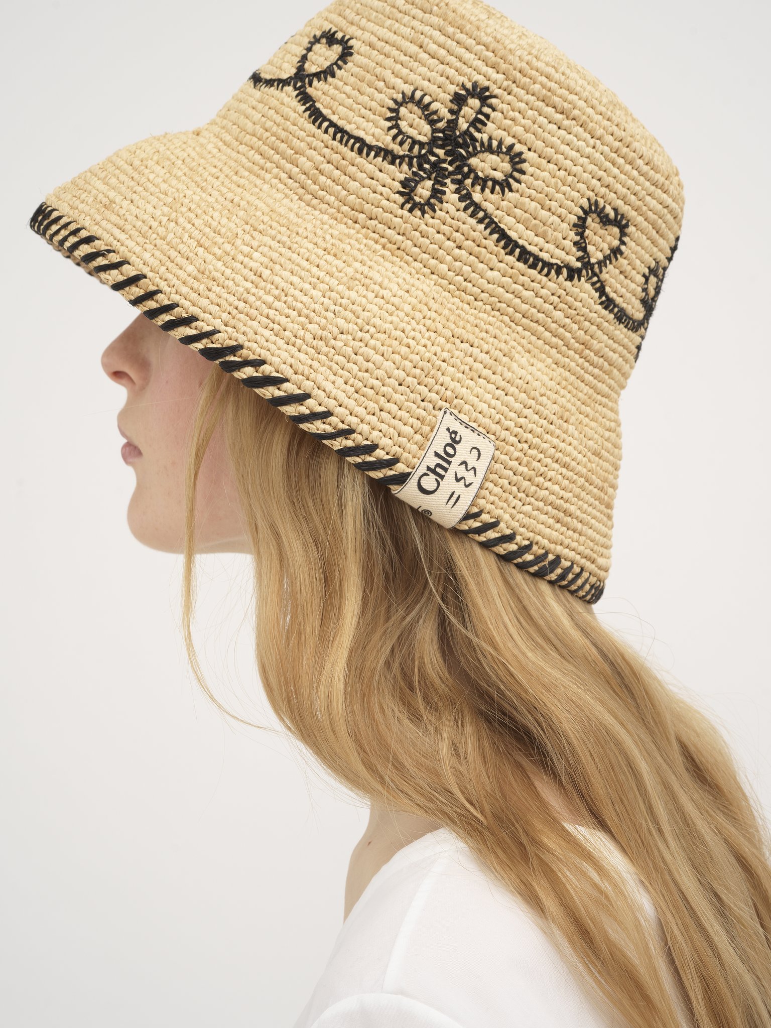 Bell hat in raffia Natural raffia
Beige - Black Top view of the product