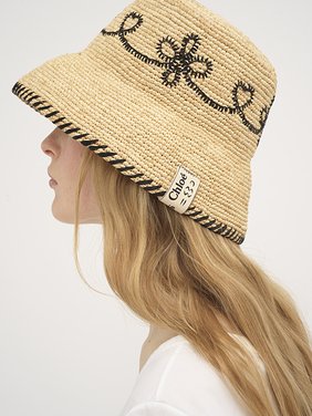 Bell hat in raffia Natural raffia
Beige - Black Top view of the product