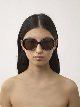 Marcie sunglasses Dark Havana lower-impact acetate & bio-based nylon 
Brown lenses Front view of the product being worn