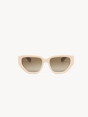 Marcie sunglasses Rose Ivory lower-impact acetate & bio-based nylon
Double gradient Brown & Ochre lenses Back view of the product