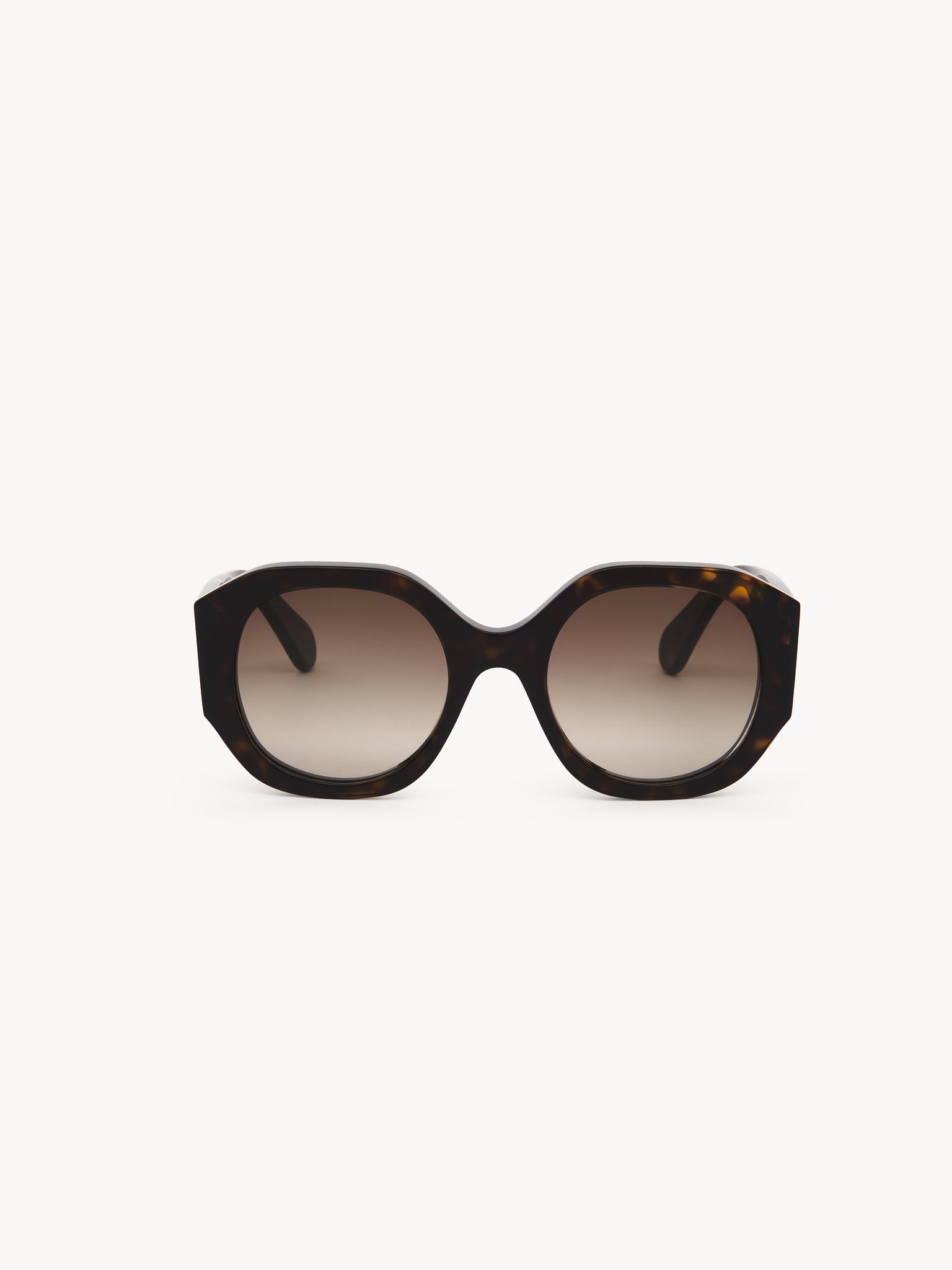 Naomy sunglasses Dark Havana lower-impact acetate & bio-based nylon
Gradient Brown lenses Back view of the product