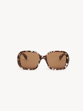 Gayia sunglasses Mottled Beige recycled acetate & bio-based nylon
Solid Brown lenses Back view of the product