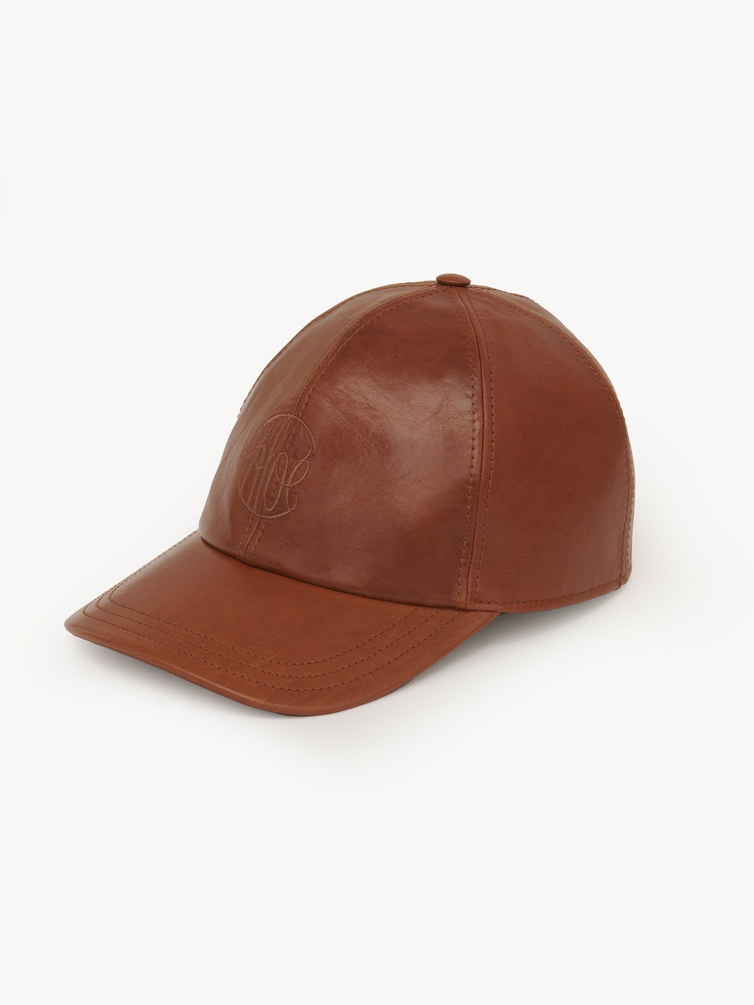 Swing cap in shiny leather Shiny calfskin with logo embroidery
Clay Brown