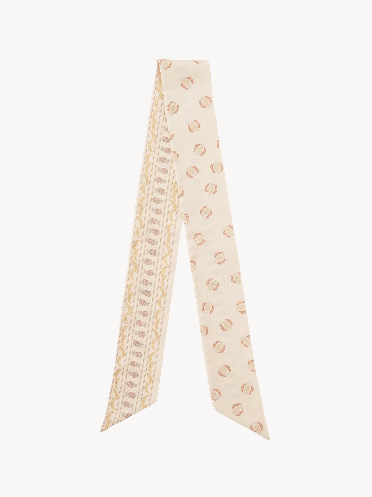 The Chloé Bananas bandeau scarf in silk Chloé Banana print on organic silk
Beige & Orange