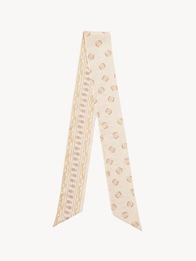 The Chloé Bananas bandeau scarf in silk Chloé Banana print on organic silk
Beige & Orange