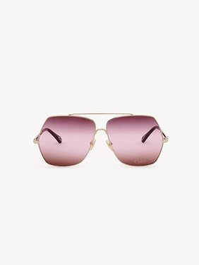 Aly sunglasses Metal & bio-based nylon
Shiny classic gold, gradient Bordeaux, pink & red lenses Back view of the product