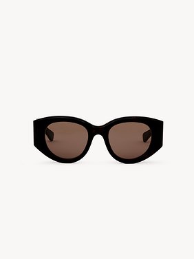 Gayia sunglasses Recycled acetate & bio-based nylon
Shiny Dark Havana, solid brown lenses Back view of the product