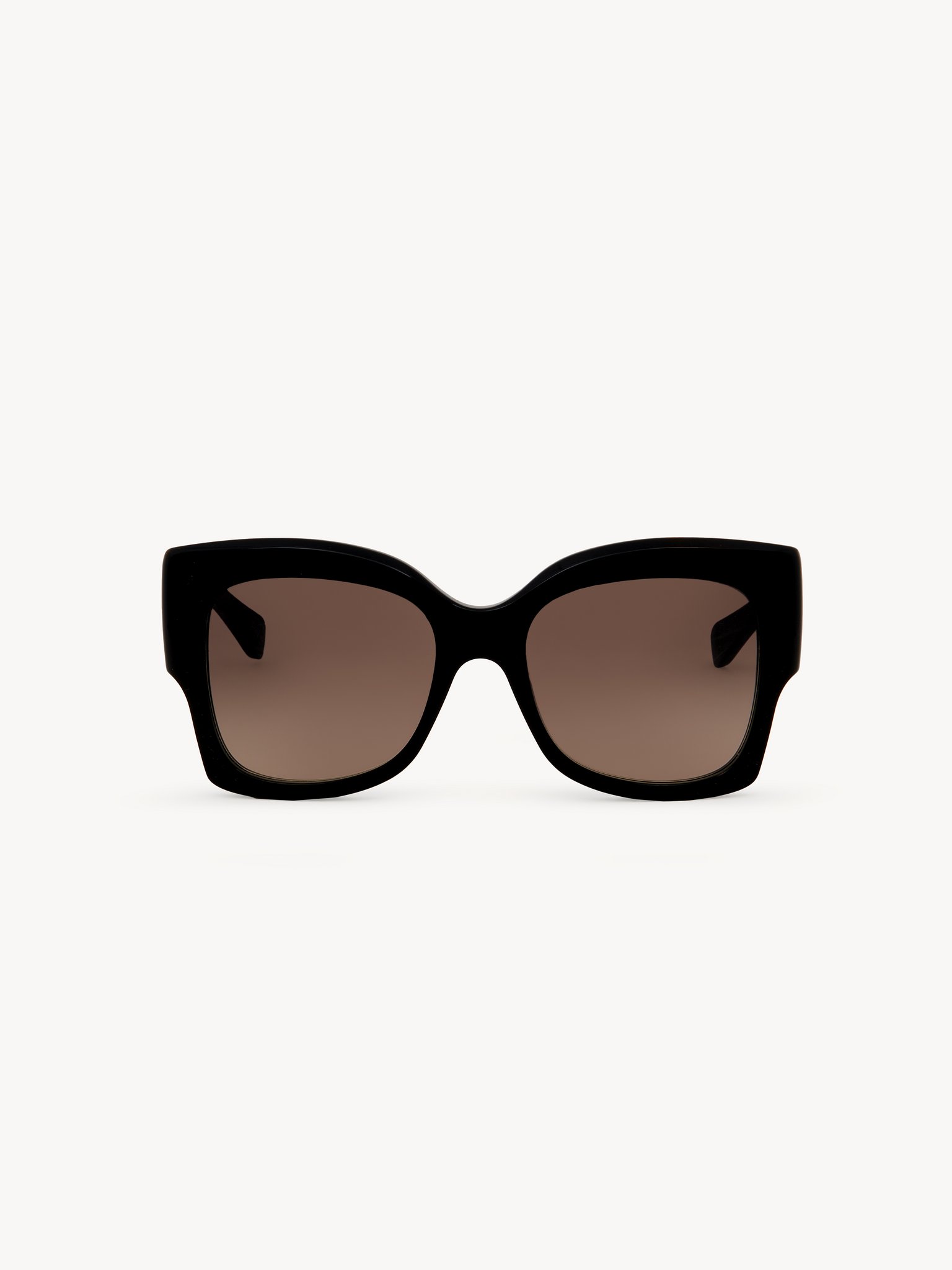 Gayia sunglasses Recycled acetate & bio-based nylon
Shiny Dark Havana, solid brown lenses Back view of the product