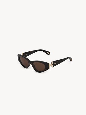 Marcie sunglasses Lower-impact acetate & bio-based nylon
Shiny Dark Havana, solid light brown lenses