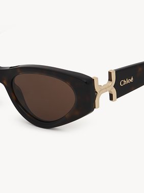 Marcie sunglasses Lower-impact acetate & bio-based nylon
Shiny Dark Havana, solid light brown lenses 