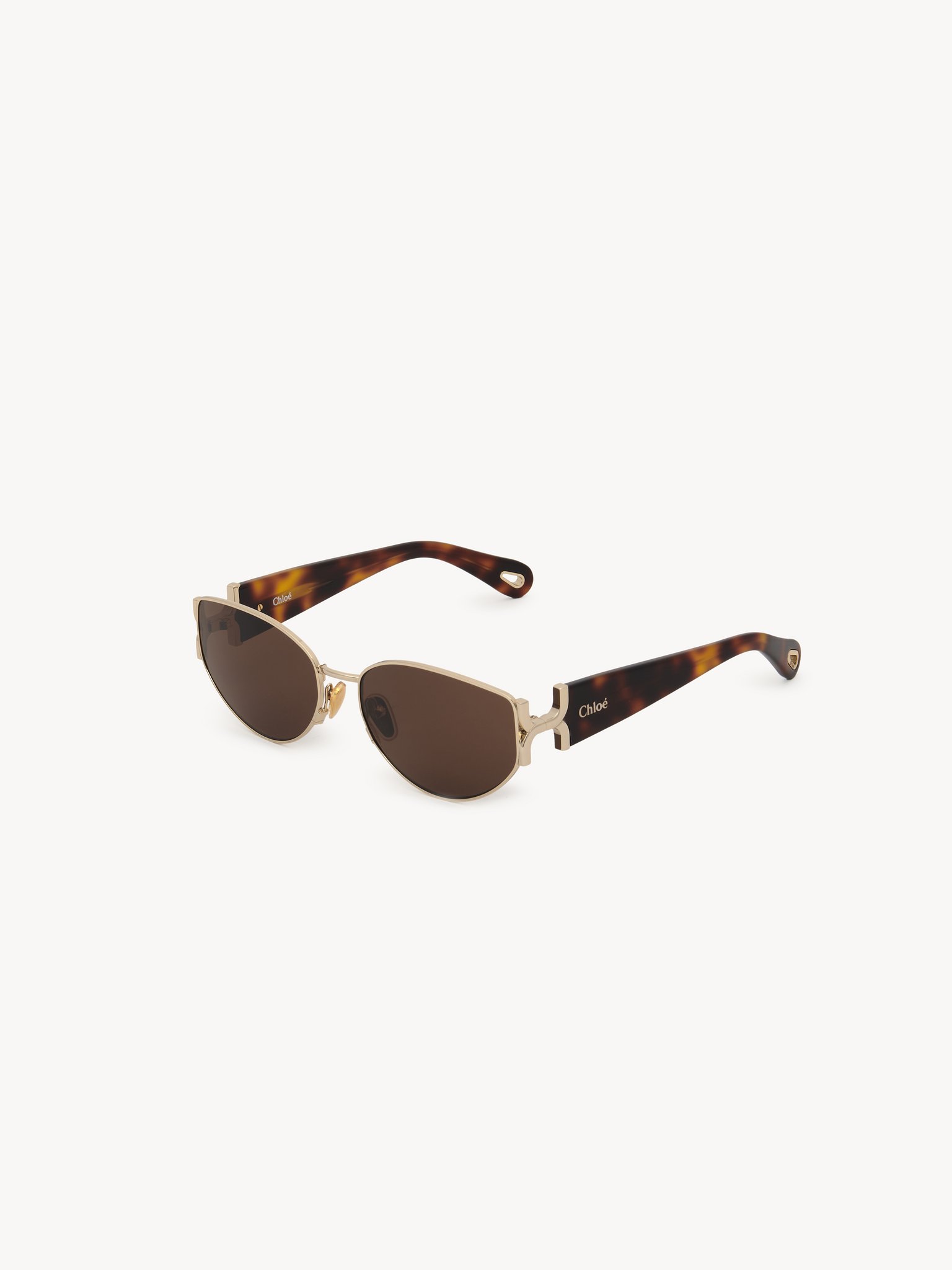 Marcie sunglasses Lower-impact acetate, metal & bio-based nylon
Shiny classic gold & shiny medium Havana, solid light brown lenses