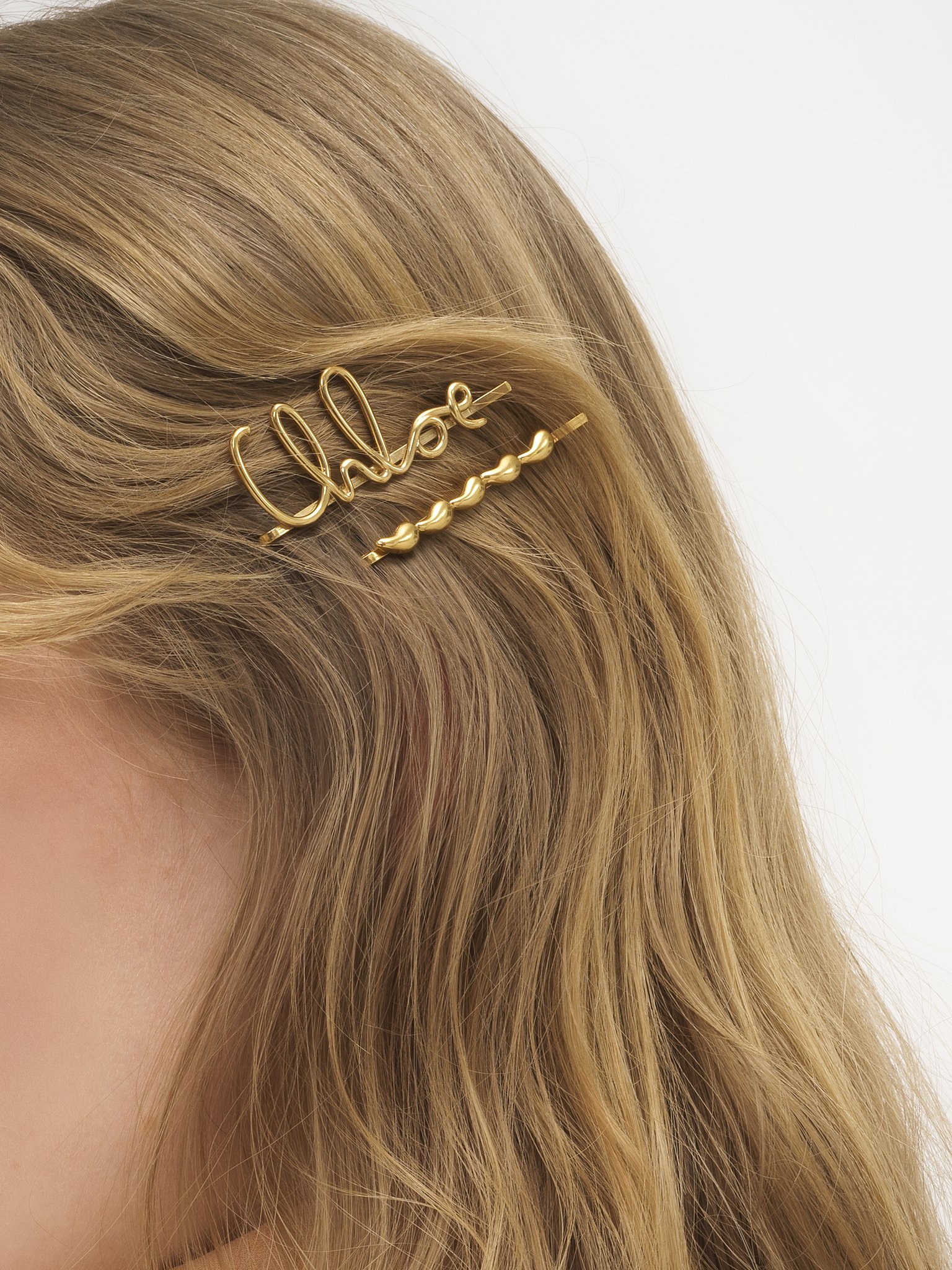 The Chloé Iconic hair clips Brass
Vintage Gold 