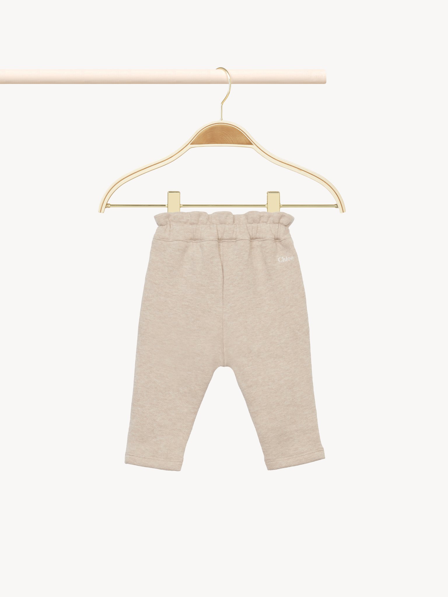 Drawstring baby pants Organic cotton fleece
Beige Marl Back view of the product