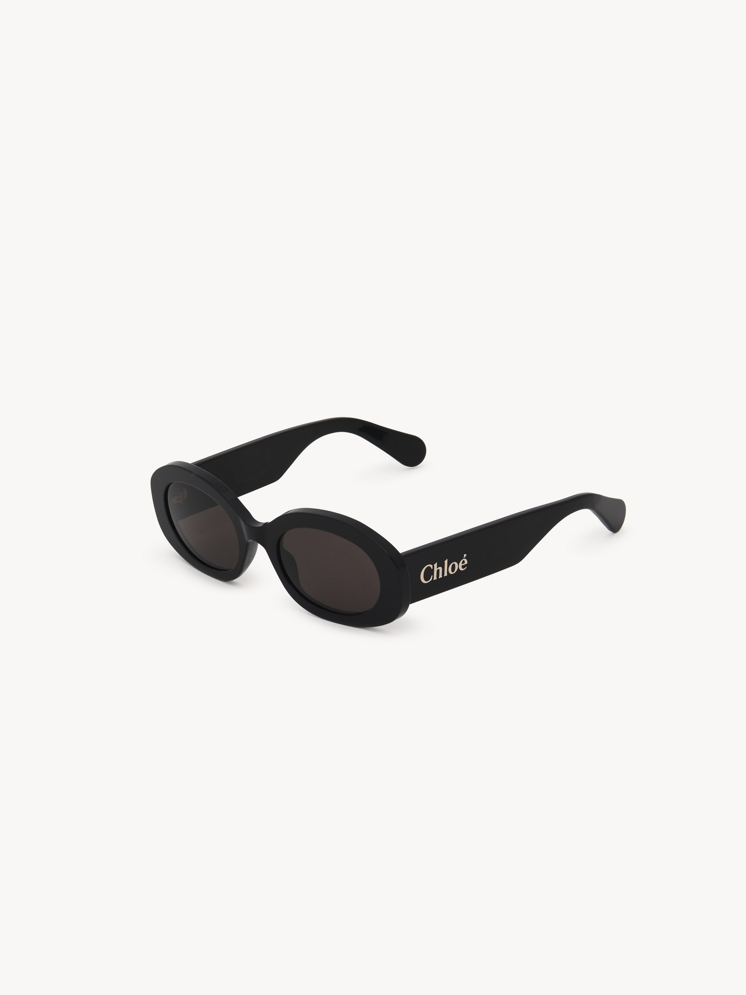 Naomy sunglasses Lower-impact acetate & bio-based nylon
Shiny black, solid gray lenses