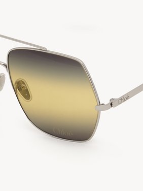 Aly sunglasses Metal & bio-based nylon
Shiny silver, gradient black, yellow & gray lenses Top view of the product