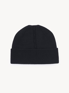 The Chloé Lace Knit beanie in wool & lace jacquard Merino wool & lace jacquard
Black Front view of the product being worn