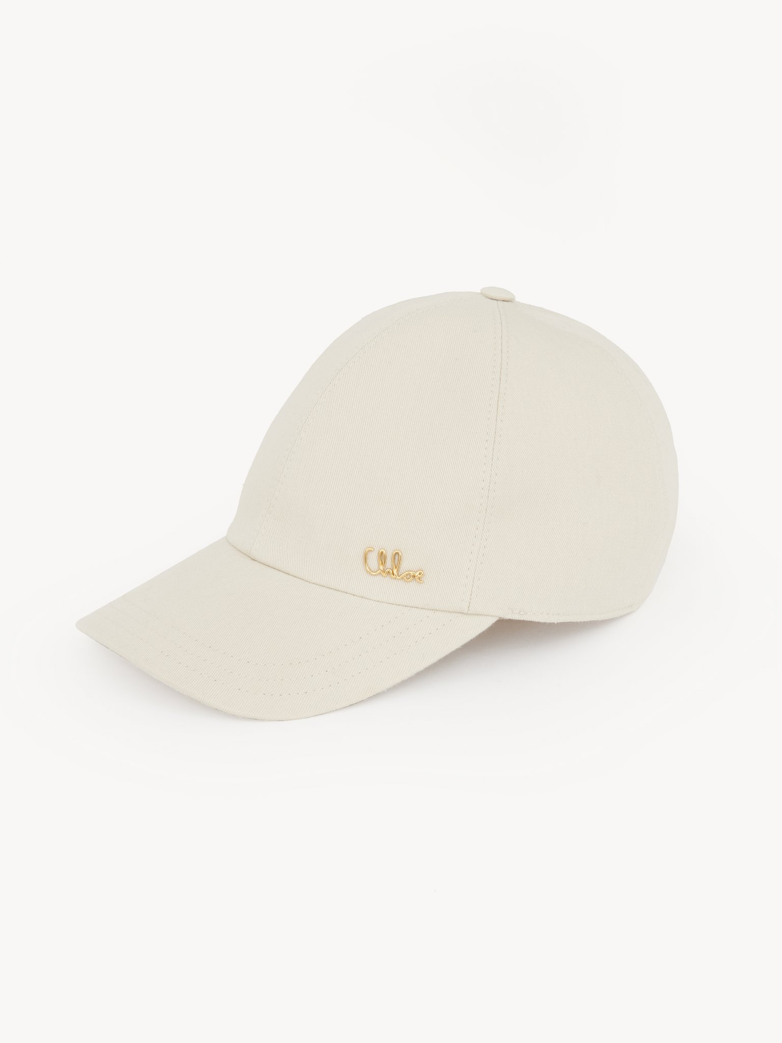 The Chloé Iconic cap in cotton canvas Deadstock recycled cotton gabardine & brass Chloé logo
Cement Beige