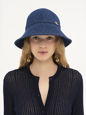 The Chloé Iconic bucket hat in denim Organic cotton denim & brass
Ocean Blue Back view of the product