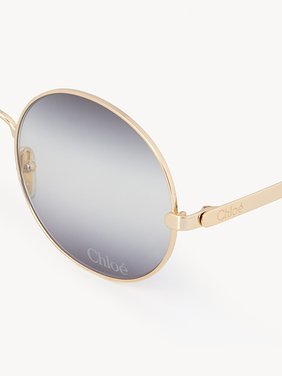 Aly sunglasses Gold metal & bio-based nylon
Gradient black, light grey & grey lenses Top view of the product