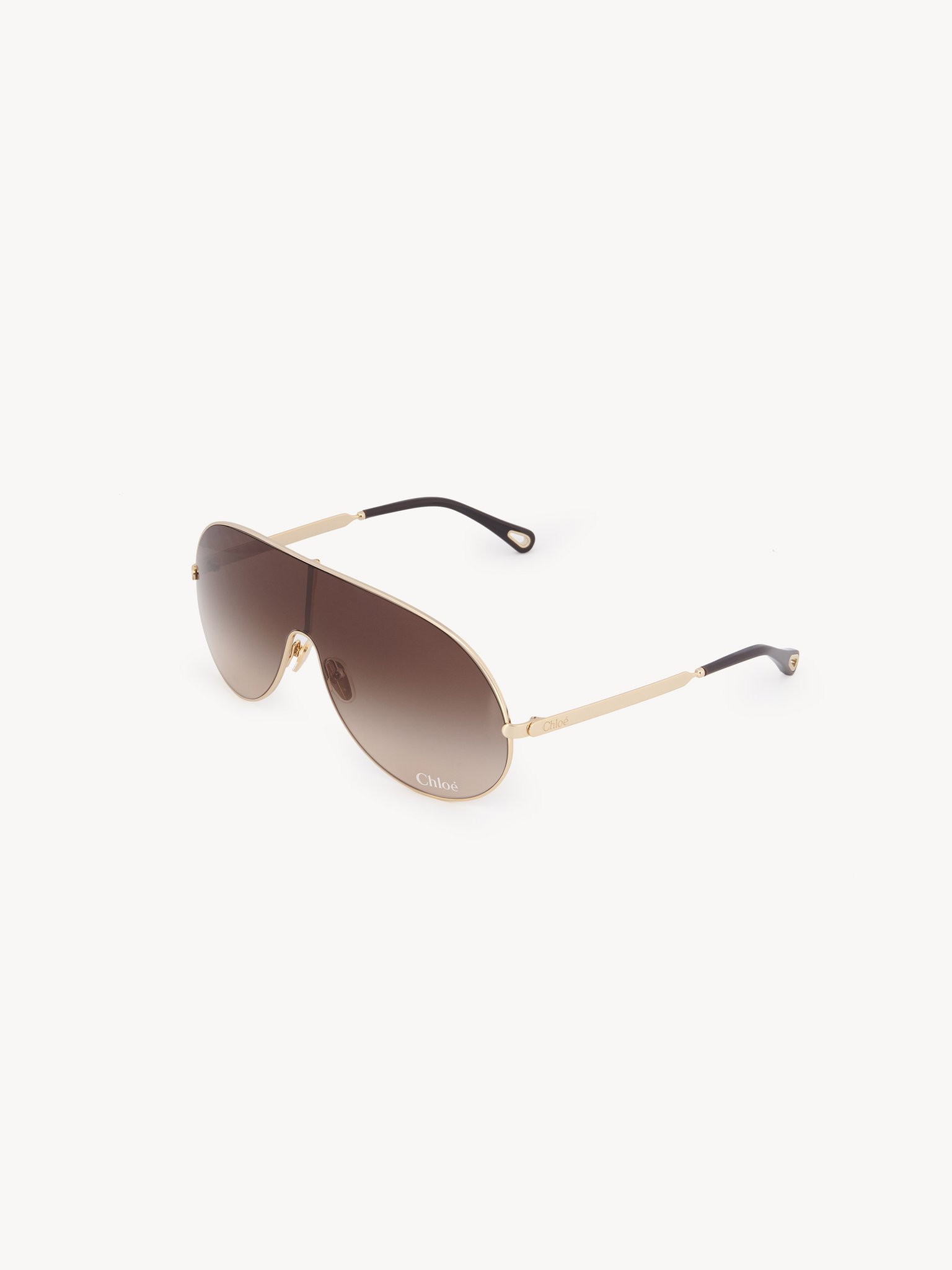 Aly sunglasses Gold metal & bio-based nylon
Gradient brown lenses