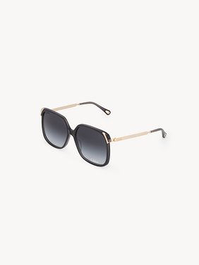 Aly sunglasses Dark grey lower-impact acetate, gold metal & bio-based nylon
Gradient blue lenses