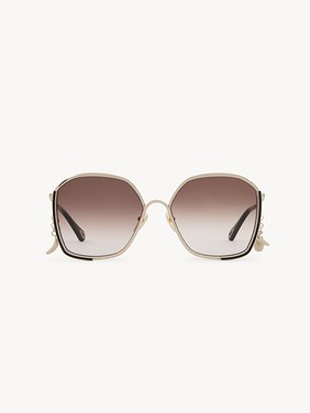 Chloé Charms sunglasses Gold metal, black enamel & bio-based nylon
Gradient brown lenses Back view of the product