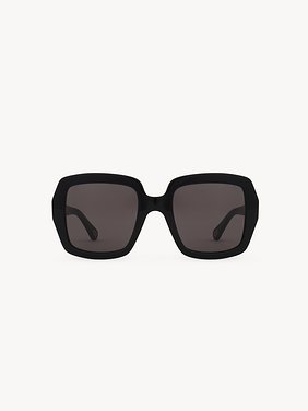 Marcie sunglasses Black lower-impact acetate & bio-based nylon
Solid grey lenses Back view of the product