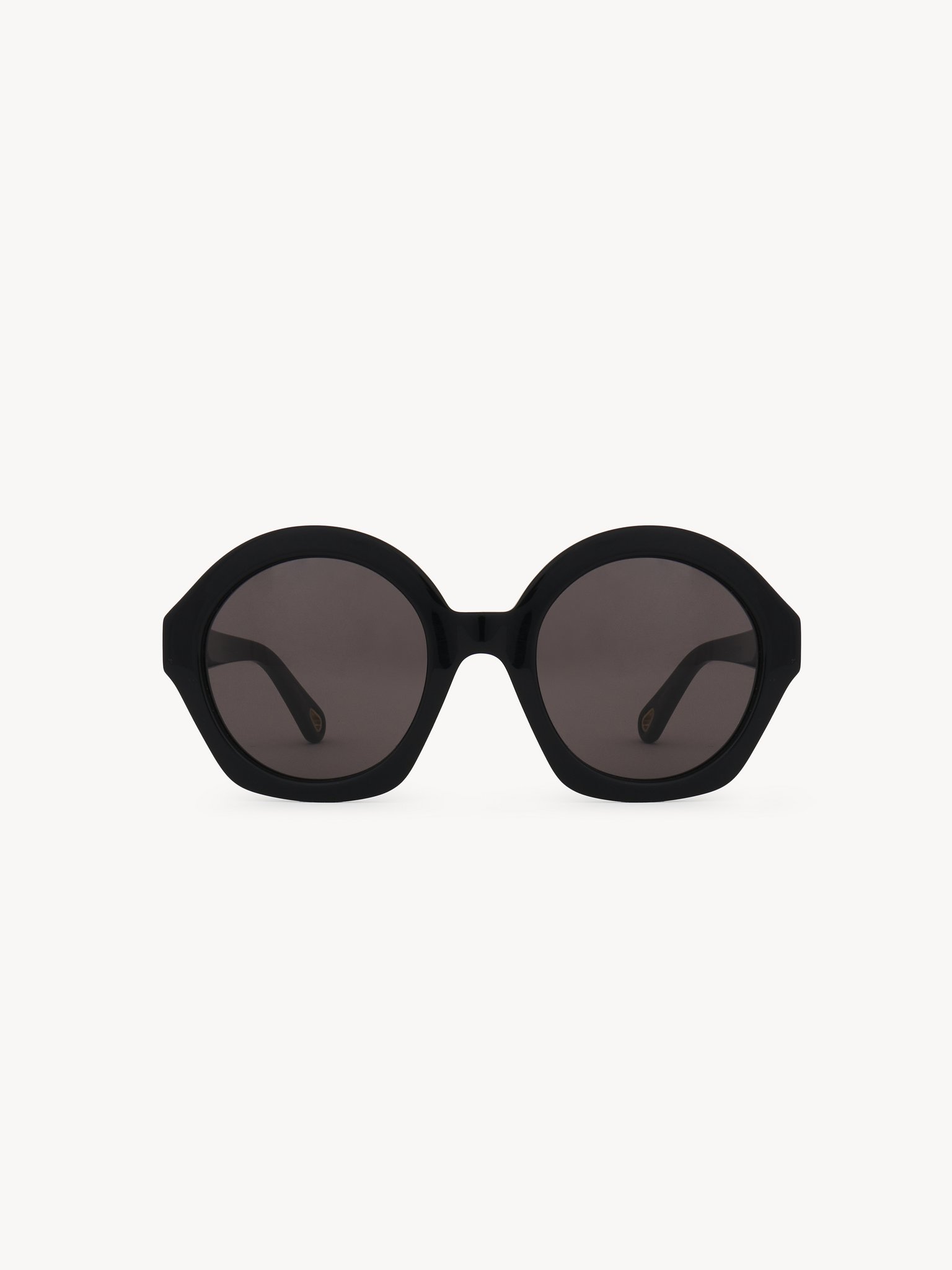 Marcie sunglasses Black lower-impact acetate & bio-based nylon
Solid grey lenses Back view of the product