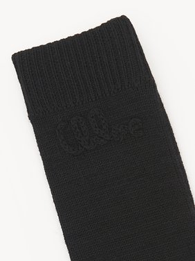 The Chloé Lace Knit fingerless gloves in wool & lace jacquard Merino wool & lace jacquard
Black Product detail