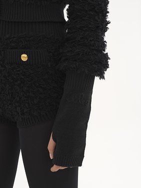 The Chloé Lace Knit fingerless gloves in wool & lace jacquard Merino wool & lace jacquard
Black Back view of the product