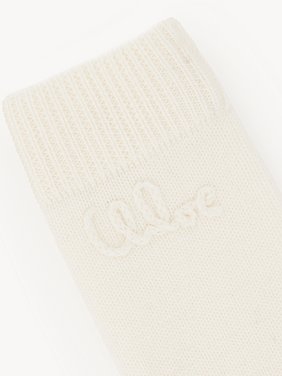 The Chloé Lace Knit fingerless gloves in wool & lace jacquard Merino wool & lace jacquard
Off White Product detail