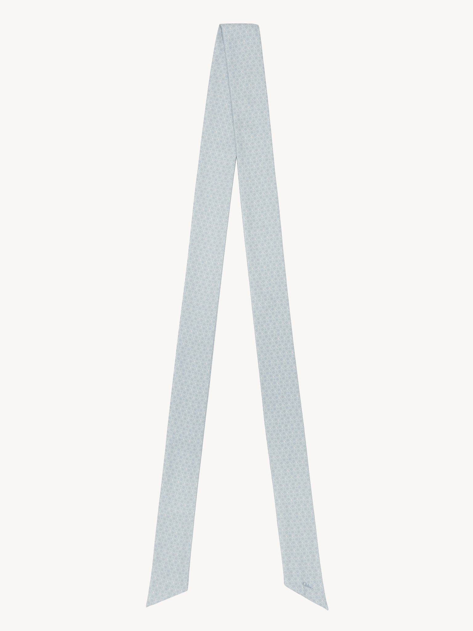 The Chloé Mini Tie-Print bandeau scarf in silk Mini tie print on organic silk
Turquoise Blue