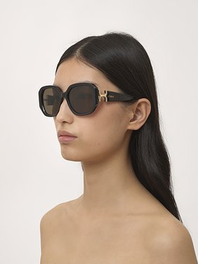 Marcie sunglasses Black lower-impact acetate & bio-based nylon
Brown lenses Front view of the product being worn