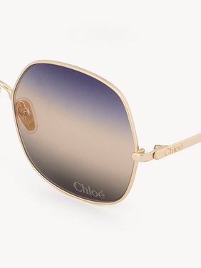 Aly sunglasses Gold metal & bio-based nylon
Gradient blue, beige & brown lenses Top view of the product