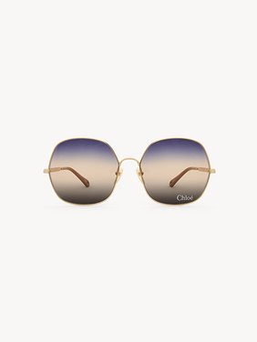 Aly sunglasses Gold metal & bio-based nylon
Gradient blue, beige & brown lenses Back view of the product