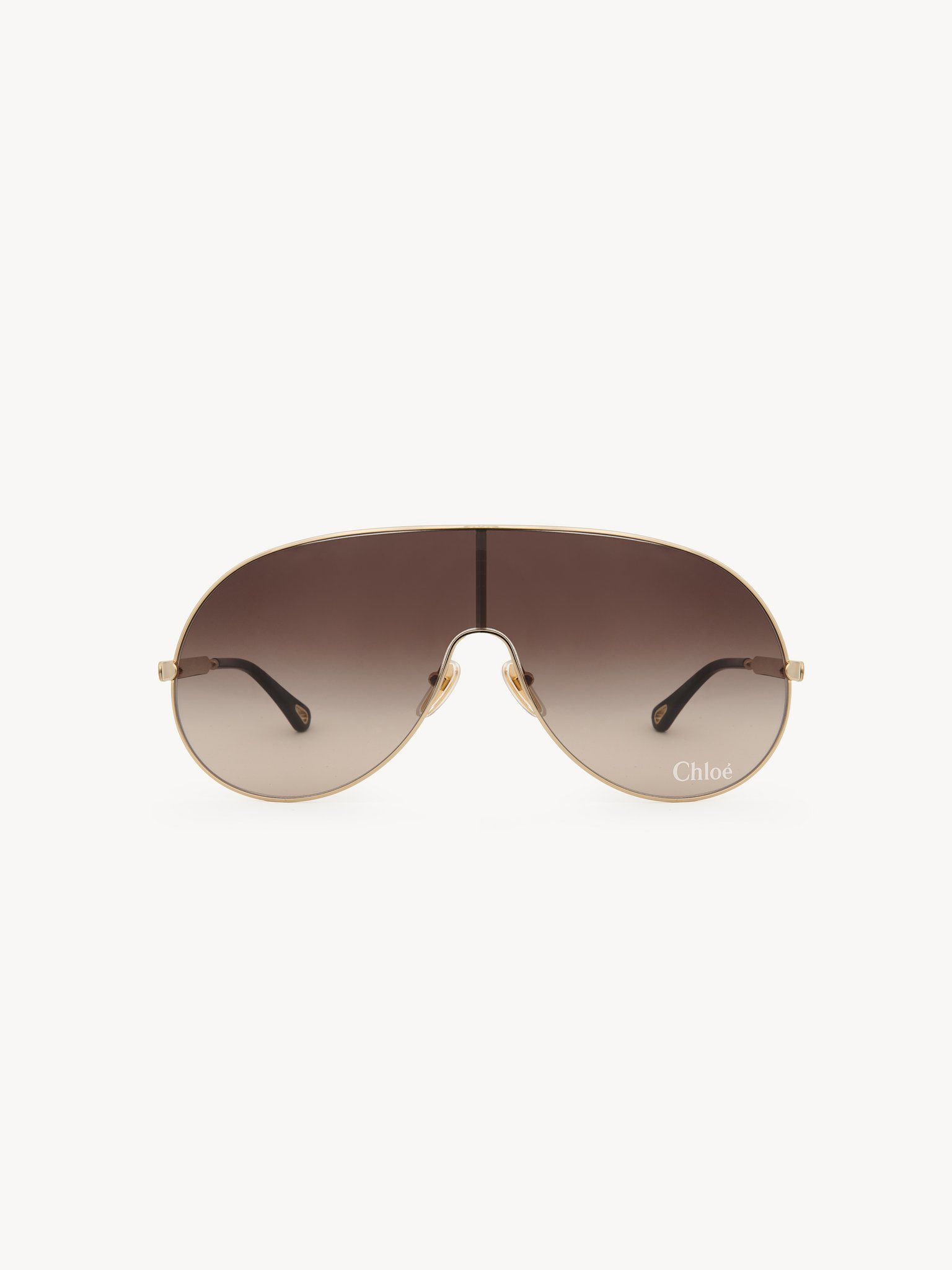 Aly sunglasses Gold metal & bio-based nylon
Gradient brown lenses Back view of the product